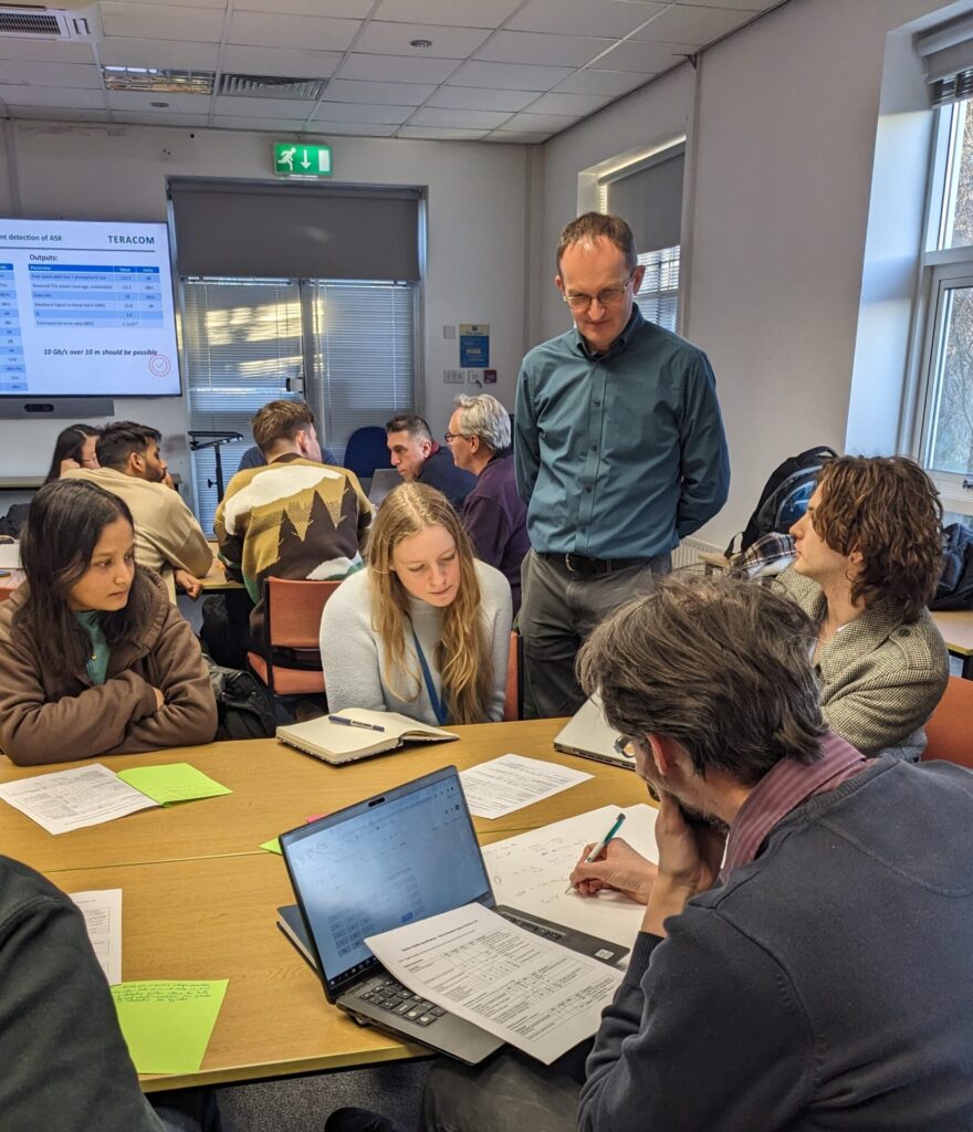 Photograph of members of the consortium in a workshop at the January 2024 meeting