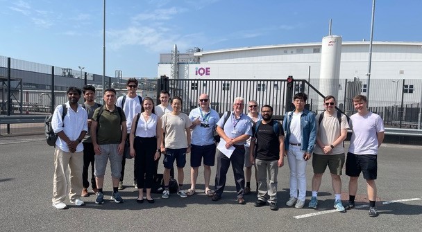 TeraCom students and postdocs outside IQE in Newport